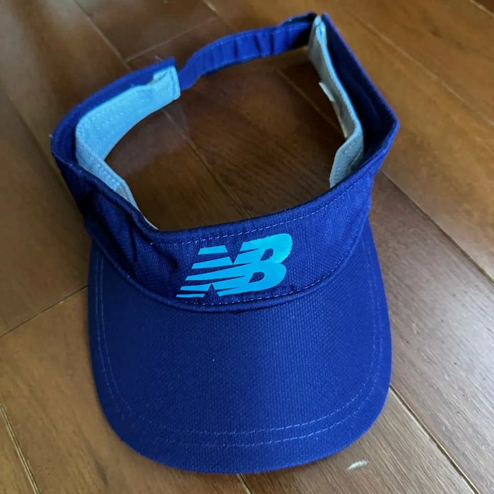 2 New Balance navy blue visors